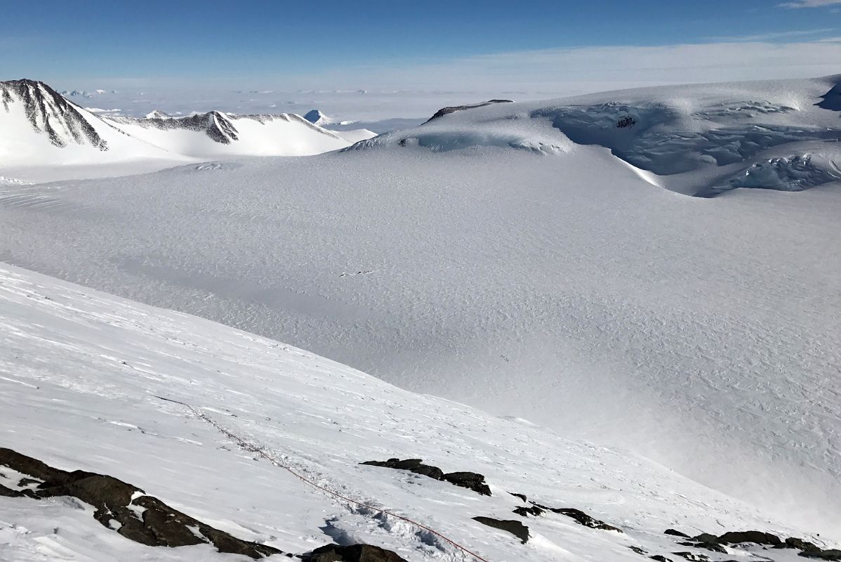 04B Looking Down At Mount Vinson Low Camp On Branscomb Glacier From Rest Stop In The Rock Band On The Climb Up The Fixed Ropes To High Camp